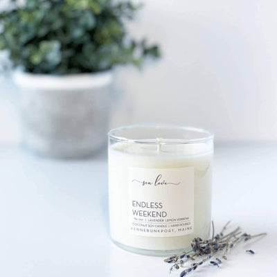 Endless Weekend by Sea Love. Candle with an elegant white label in a clear glass vessel.